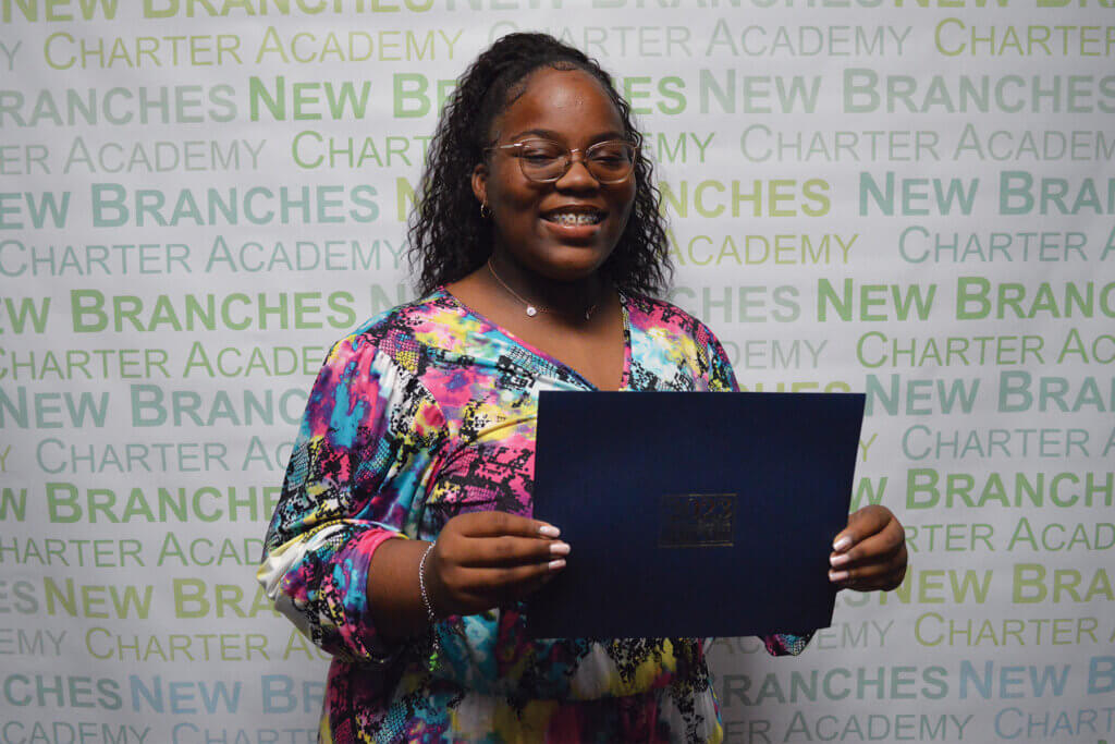 Photo of Maree King graduating at New Branches Charter Academy